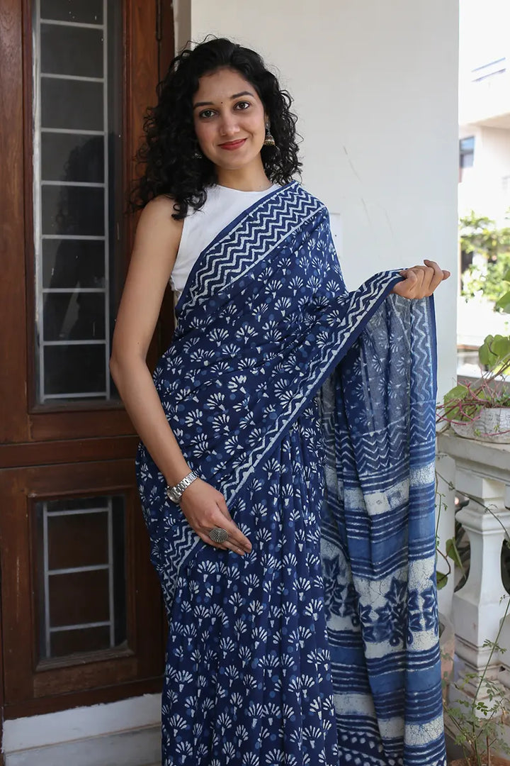 The mulmul saree is one of the most versatile and elegant pieces that you can wear. The Indigo Muse cotton saree is a great option for daily wear as it looks classy and gives you an effortless style statement.