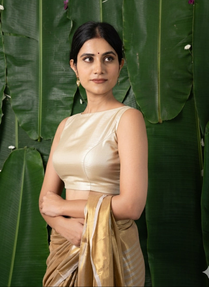 Navya - Golden Tissue Sleeveless Back Open Blouse