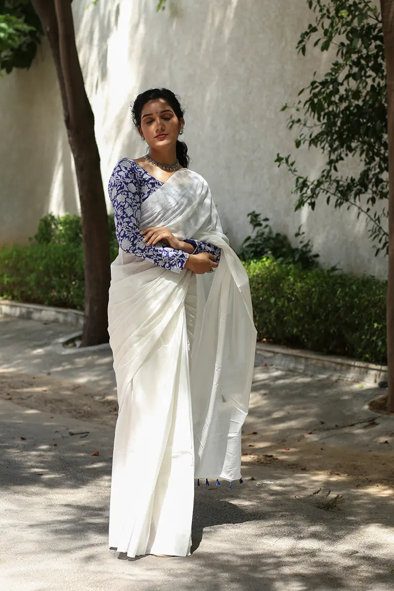 Twirl In Pearl- White Mulmul Cotton Saree with Tassels