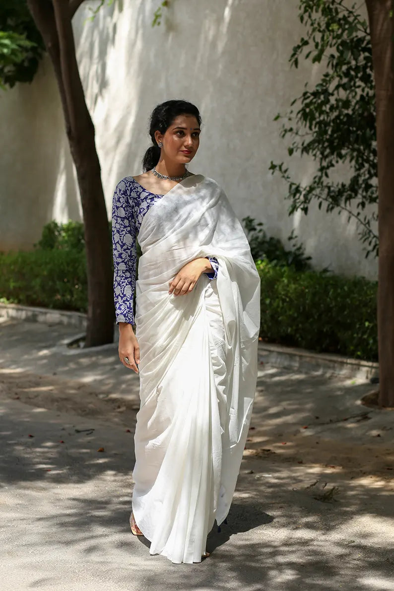 Twirl In Pearl- White Mulmul Cotton Saree with Tassels