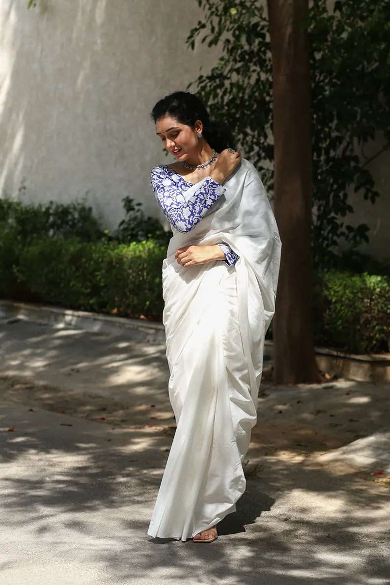 Twirl In Pearl- White Mulmul Cotton Saree with Tassels