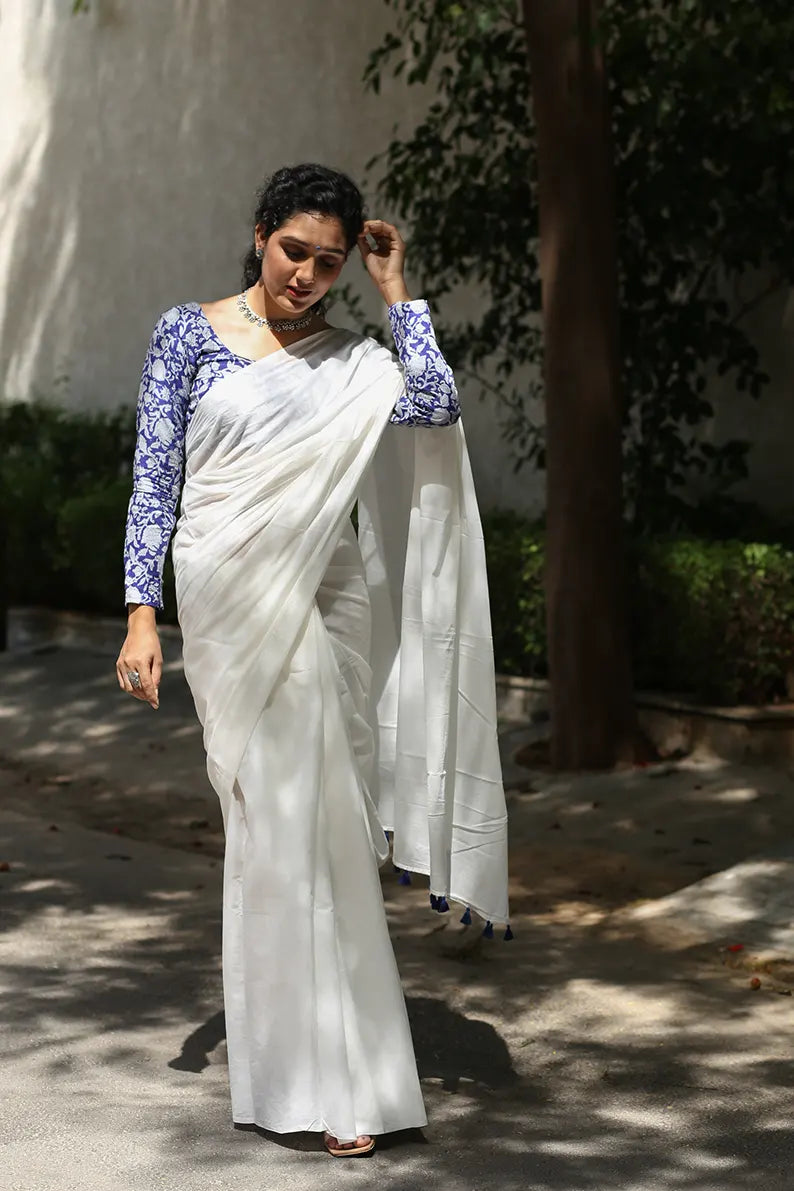 Twirl In Pearl- White Mulmul Cotton Saree with Tassels