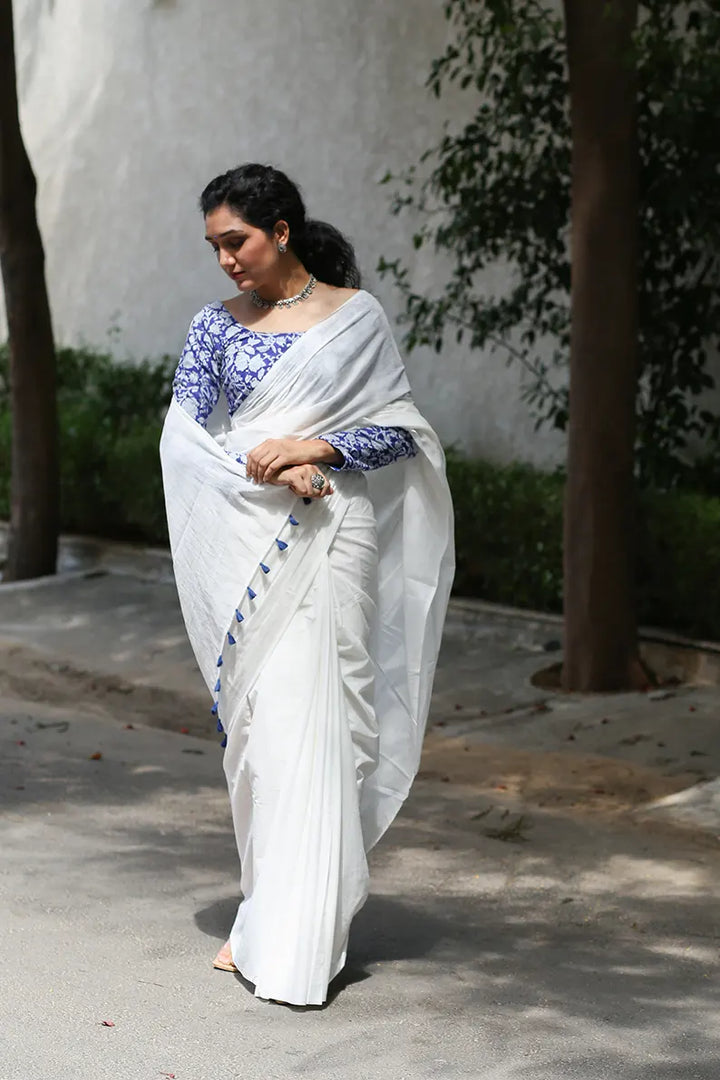 Twirl In Pearl- White Mulmul Cotton Saree with Tassels