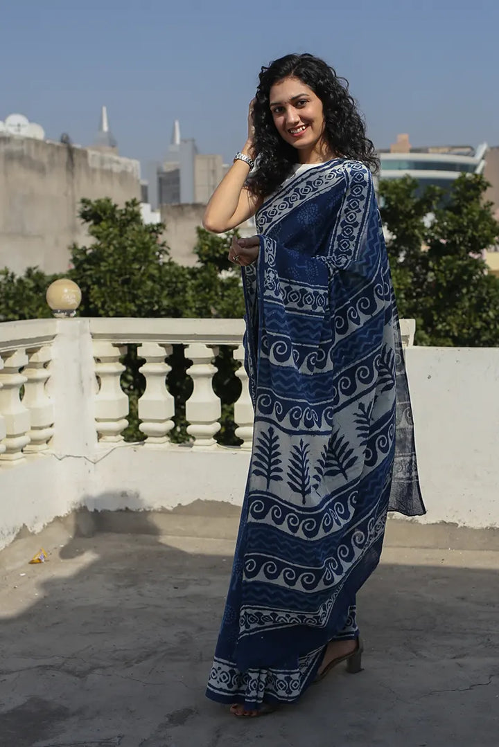 The Indigo Bouquet cotton saree is a great option for daily wear as it looks classy and gives you an effortless style statement.